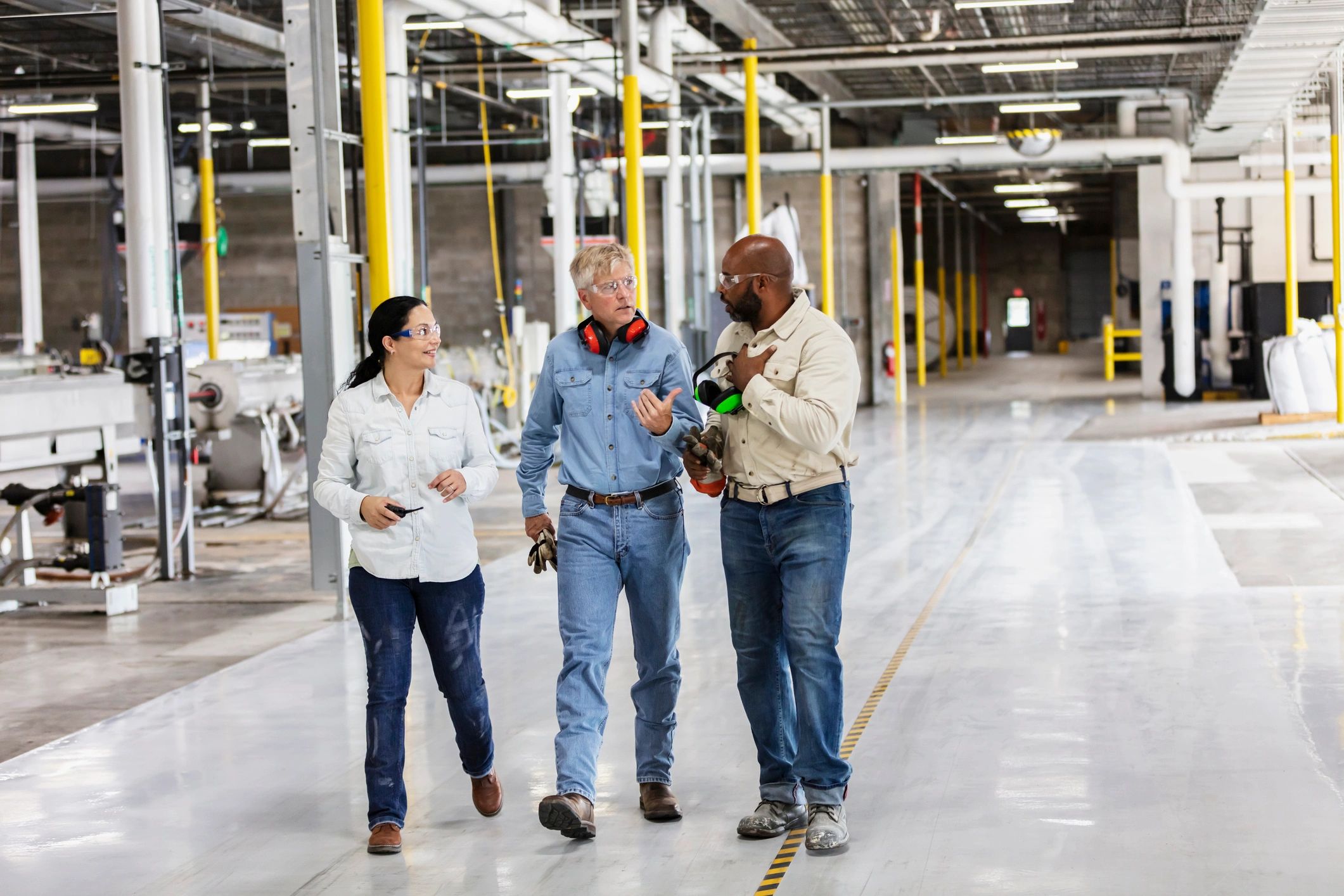 FirstLine Roofing team discussing an inspection plan