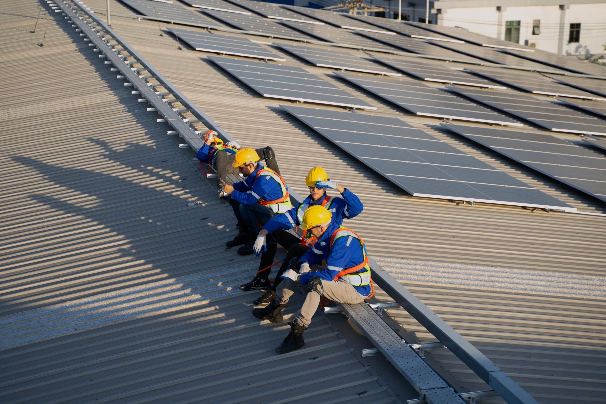 Roofing crew working on a commercial rooftop